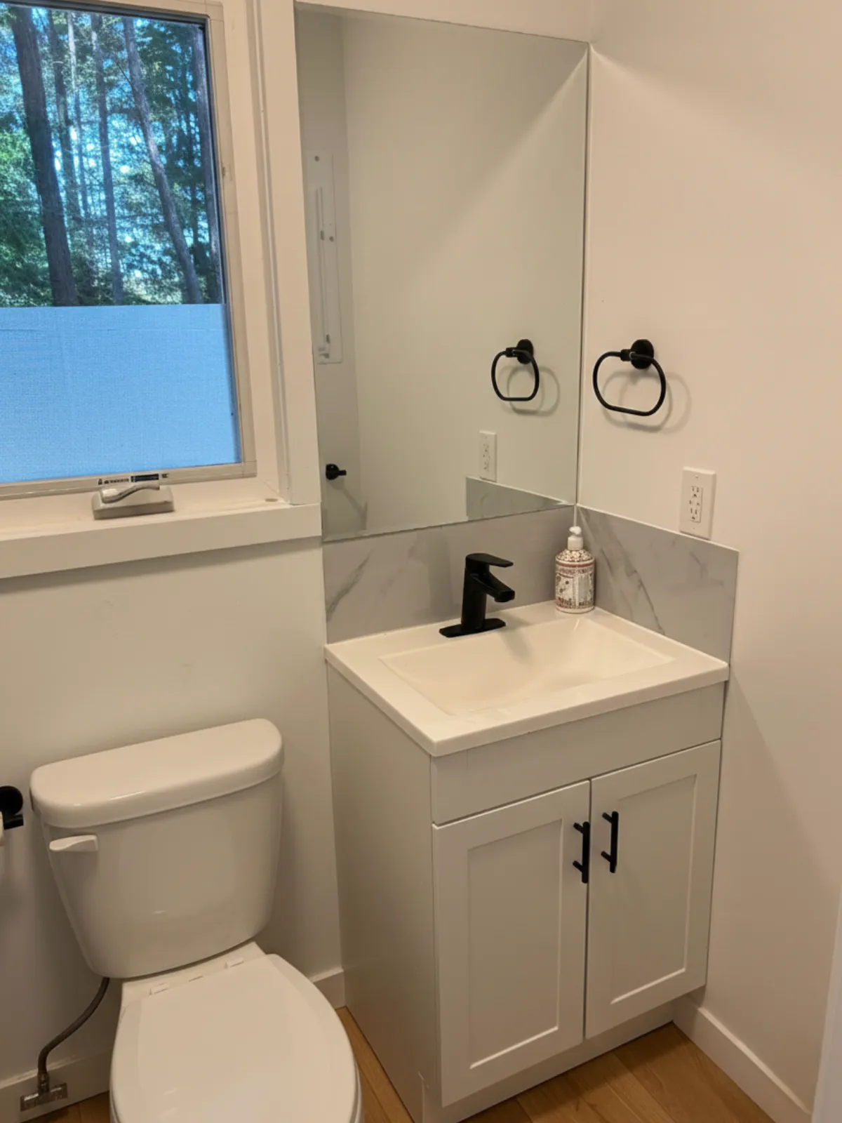 Clean, modern washroom interior inside a NED Living modular home unit