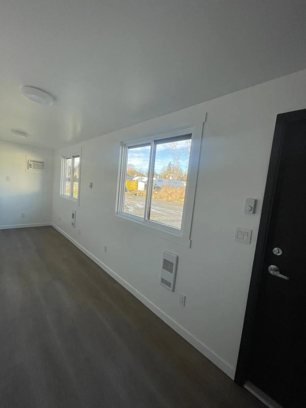 container lunchroom interior with windows and heating unit